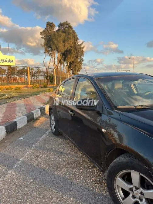 شيفروليه كروز 2010 أسود مستعملة للبيع - 3