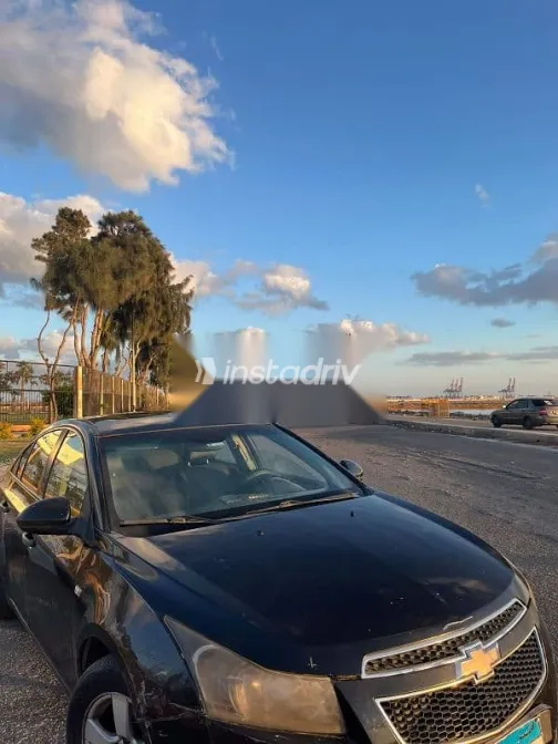 شيفروليه كروز 2010 أسود مستعملة للبيع - 7