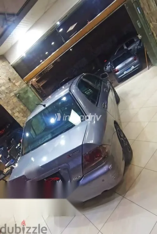 ميتسوبيشي لانسر 2014 رمادي مستعملة للبيع - 4