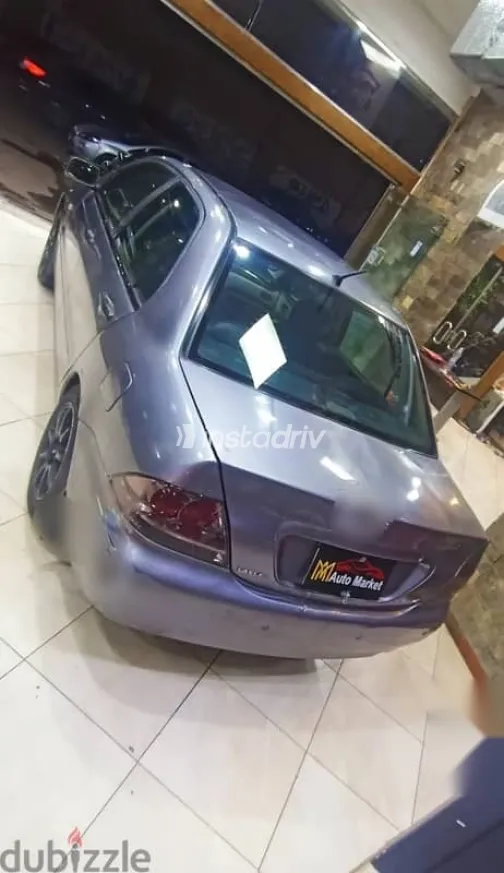 ميتسوبيشي لانسر 2014 رمادي مستعملة للبيع - 5