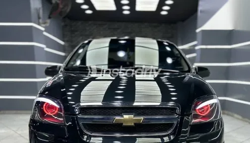 شيفروليه افيو 2010 أسود مستعملة للبيع - 2