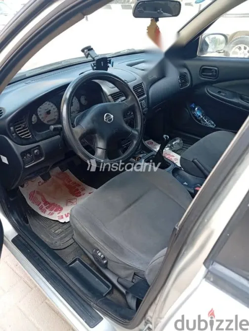 نيسان صنى 2007 فضي مستعملة للبيع - 4