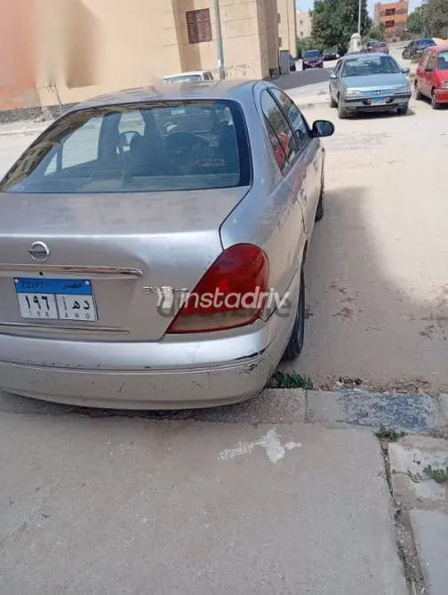 نيسان صنى 2007 فضي مستعملة للبيع - 8