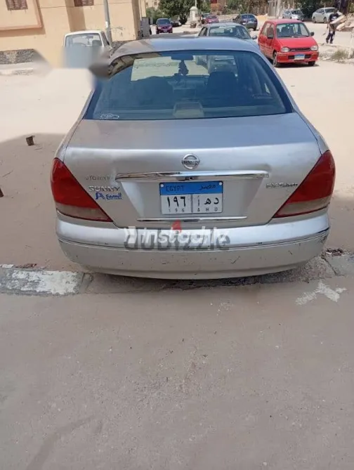 نيسان صنى 2007 فضي مستعملة للبيع - 9