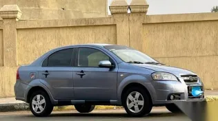 شيفروليه افيو 2013 أزرق غامق مستعملة للبيع