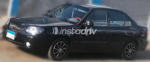 هيونداي فيرنا 2010 أسود مستعملة للبيع - 1