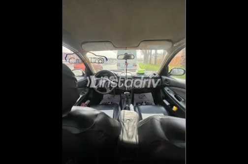 نيسان صنى 2010 أبيض مستعملة للبيع - 1