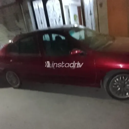 رينو لوجان 2001 أحمر مستعملة للبيع - 2