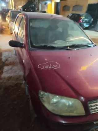 فيات بونتو 2012 أحمر مستعملة للبيع