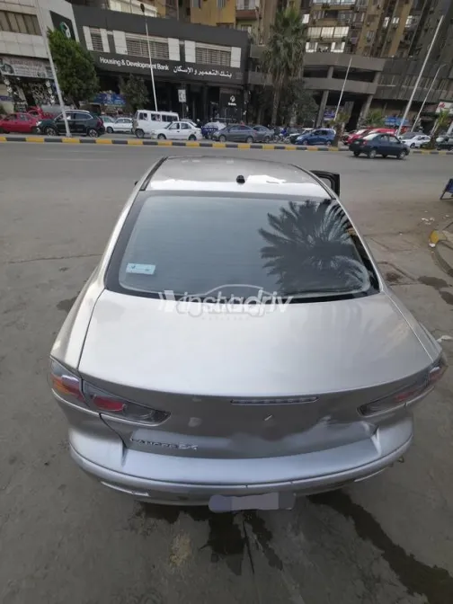 ميتسوبيشي لانسر اى اكس شارك 2015 شامبين مستعملة للبيع - 1