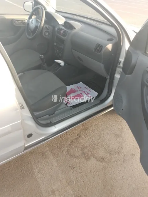 اوبل كورسا 2003 أبيض مستعملة للبيع - 5