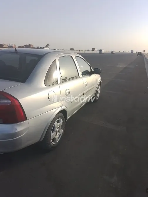 اوبل كورسا 2003 أبيض مستعملة للبيع - 8