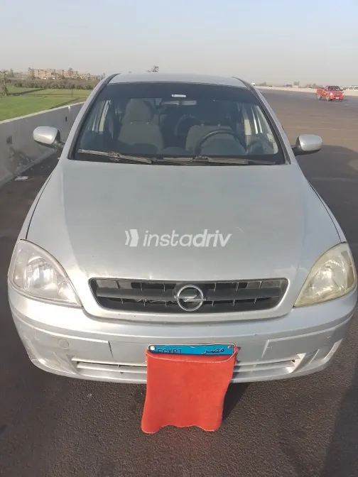 اوبل كورسا 2003 أبيض مستعملة للبيع - 9