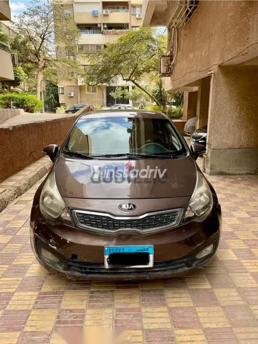 كيا ريو 2012 بني مستعملة للبيع - 1