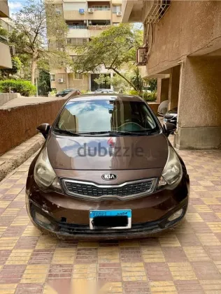 كيا ريو 2012 بني مستعملة للبيع