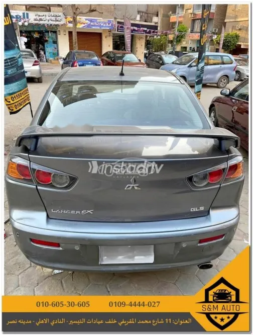 ميتسوبيشي لانسر 2015 فضي مستعملة للبيع - 2