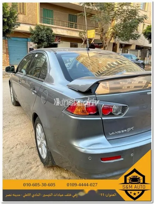 ميتسوبيشي لانسر 2015 فضي مستعملة للبيع - 5