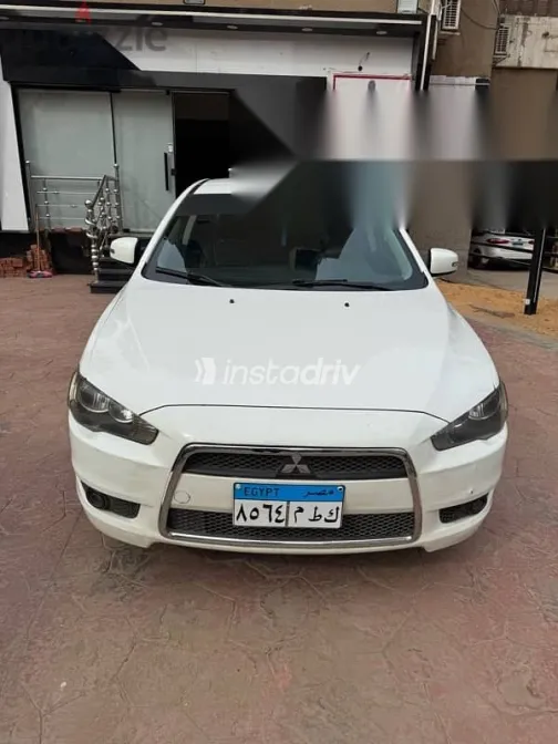 ميتسوبيشي لانسر 2015 أبيض مستعملة للبيع - 2