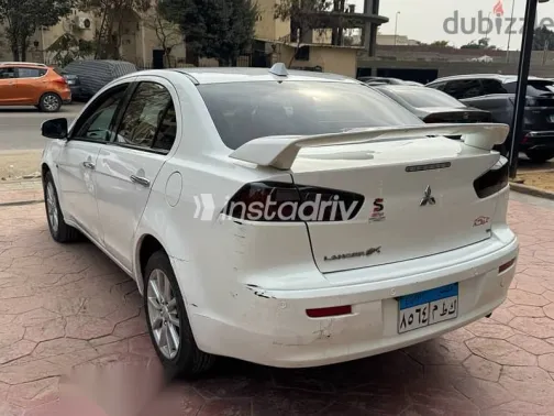 ميتسوبيشي لانسر 2015 أبيض مستعملة للبيع - 8