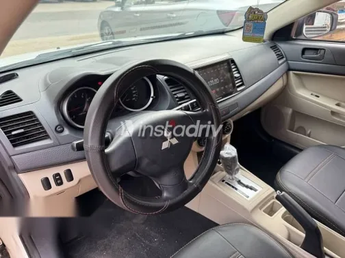 ميتسوبيشي لانسر 2015 أبيض مستعملة للبيع - 10