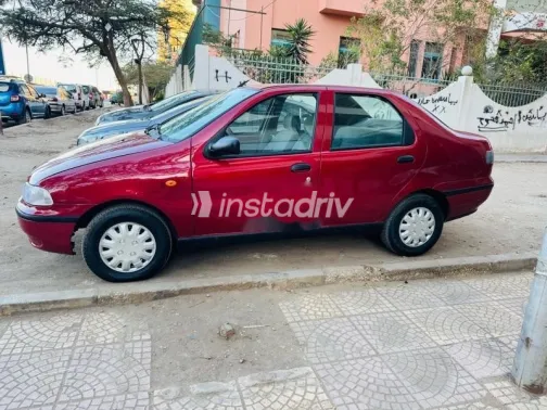 فيات سينا 2001 أحمر غامق مستعملة للبيع - 5