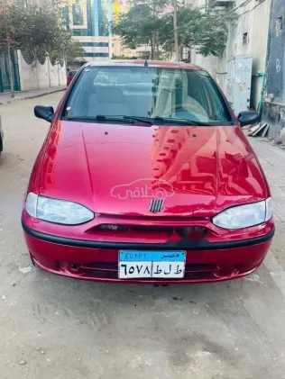 فيات سينا 2001 أحمر غامق مستعملة للبيع