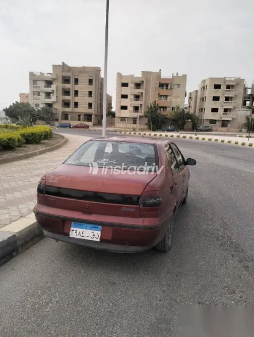 فيات سينا 2001 أحمر مستعملة للبيع - 10