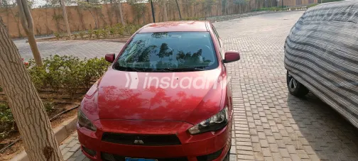 ميتسوبيشي لانسر 2014 أبيض مستعملة للبيع - 7