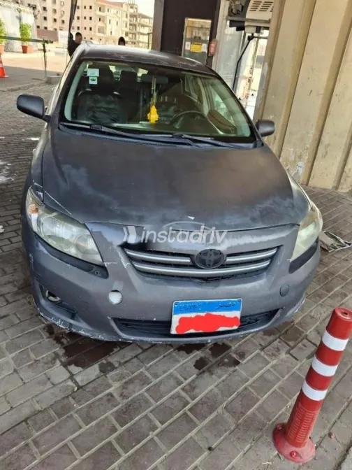 تويوتا كورولا 2010 رمادي مستعملة للبيع - 1