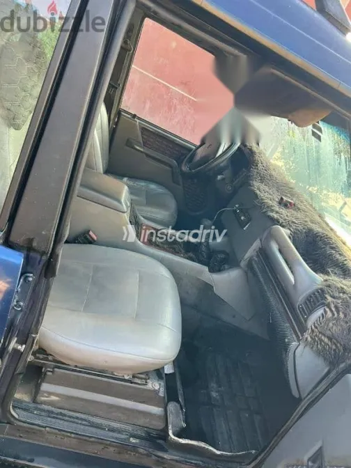 جيب شيروكي 1995 أزرق غامق مستعملة للبيع - 4