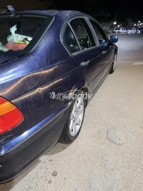 بي ام دبليو 318 2005 أزرق غامق مستعملة للبيع - 4