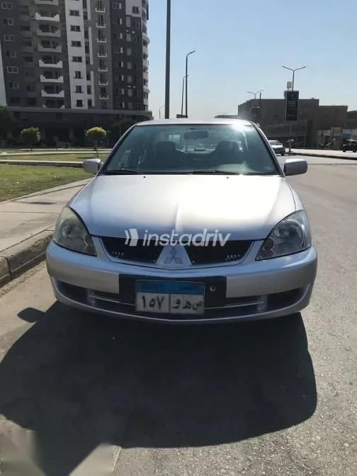 ميتسوبيشي لانسر 2007 فضي مستعملة للبيع - 1