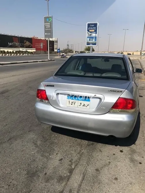 ميتسوبيشي لانسر 2007 فضي مستعملة للبيع - 4