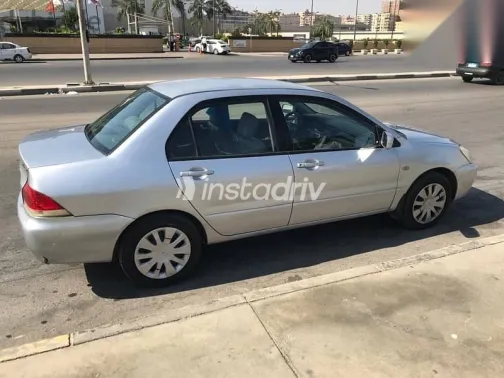 ميتسوبيشي لانسر 2007 فضي مستعملة للبيع - 5