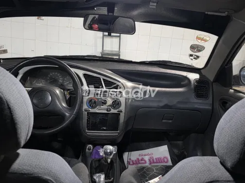 شيفروليه لانوس 2014 أحمر غامق مستعملة للبيع - 2