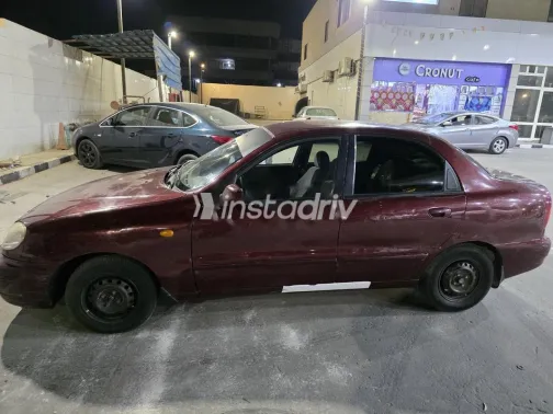 شيفروليه لانوس 2014 أحمر غامق مستعملة للبيع - 4