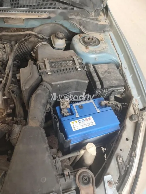 ميتسوبيشي لانسر بومة 2004 سماوي مستعملة للبيع - 1