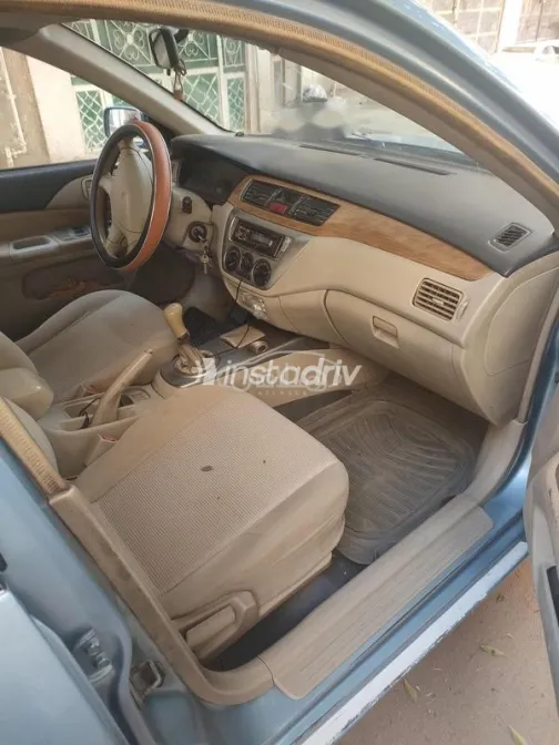 ميتسوبيشي لانسر بومة 2004 سماوي مستعملة للبيع - 3