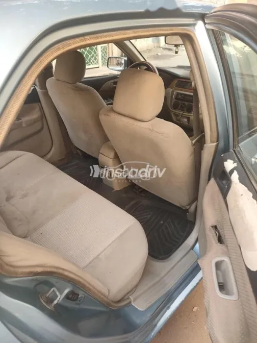 ميتسوبيشي لانسر بومة 2004 سماوي مستعملة للبيع - 4