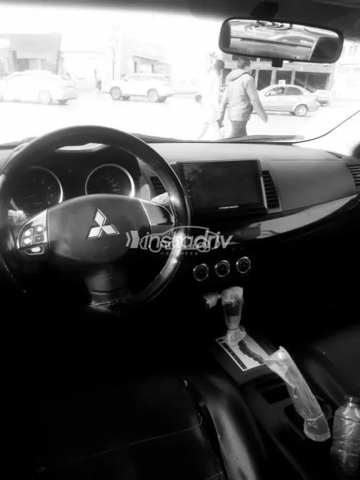 ميتسوبيشي لانسر اى اكس شارك 2015 فضي مستعملة للبيع - 4