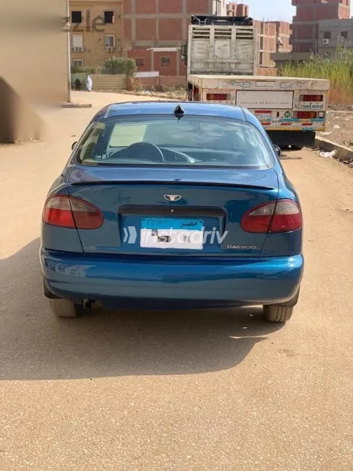 دايو لانوس 1999 أزرق غامق مستعملة للبيع - 1