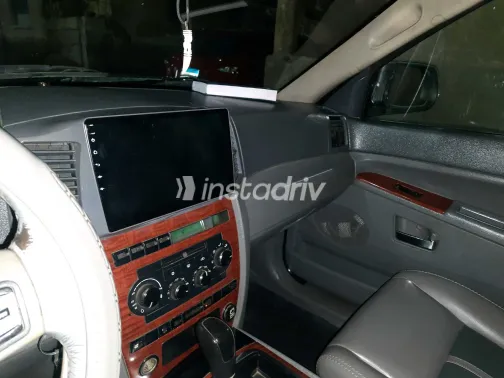 جيب جراند شيروكي 2006 أبيض مستعملة للبيع - 9