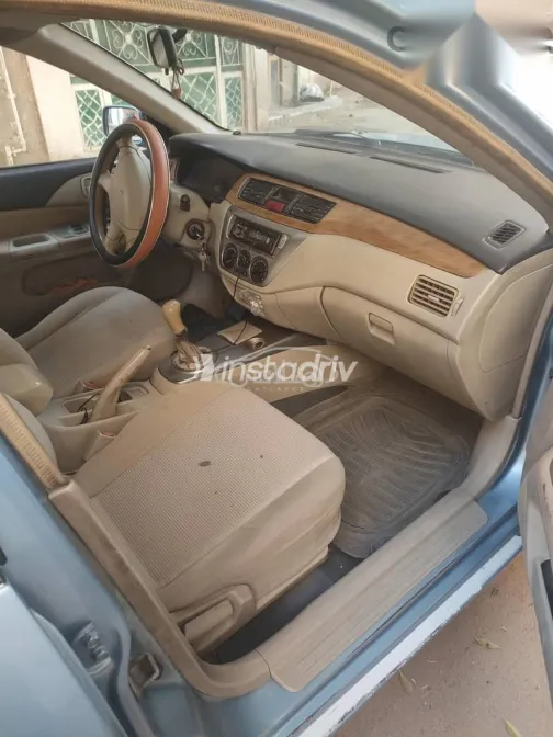 ميتسوبيشي لانسر 2004 أبيض مستعملة للبيع - 3