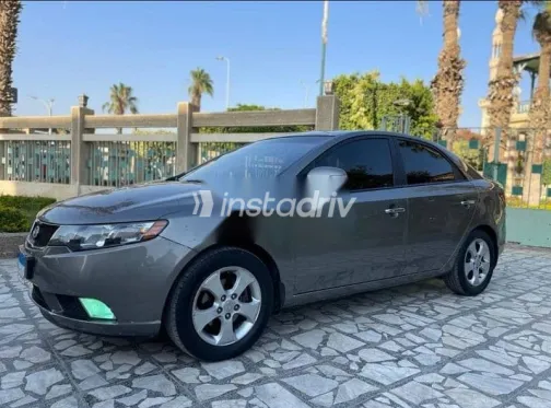 كيا سيراتو 2010 رمادي مستعملة للبيع - 1