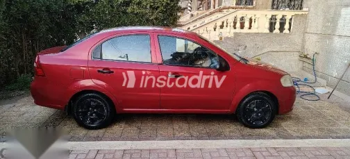 شيفروليه افيو 2009 أحمر مستعملة للبيع - 1