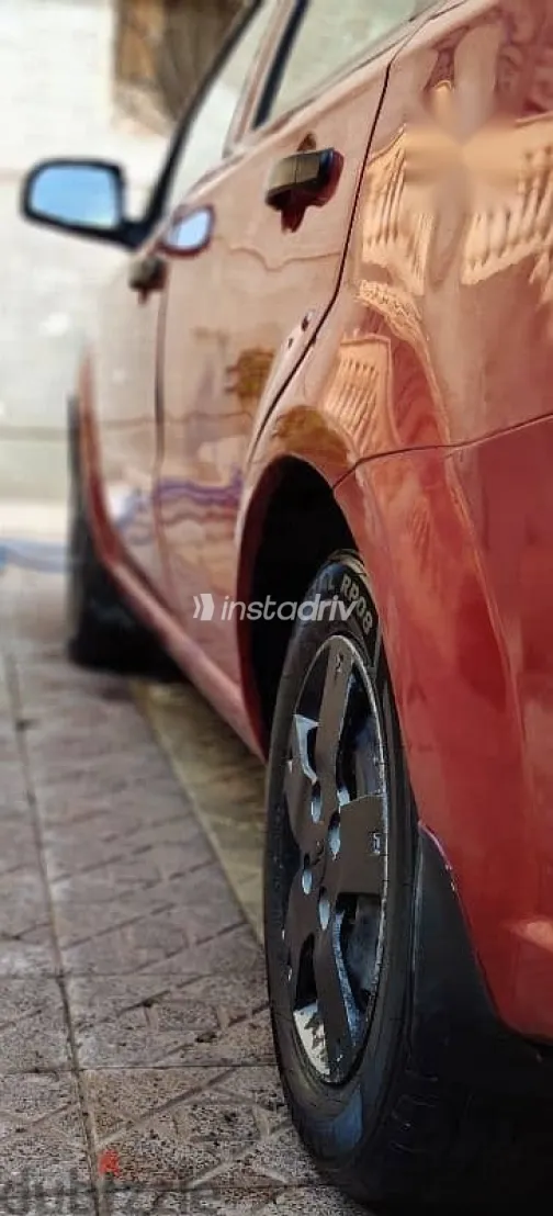 شيفروليه افيو 2009 أحمر مستعملة للبيع - 3