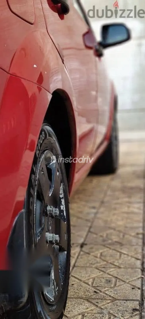 شيفروليه افيو 2009 أحمر مستعملة للبيع - 4