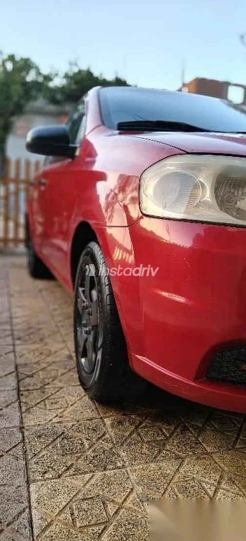 شيفروليه افيو 2009 أحمر مستعملة للبيع - 5