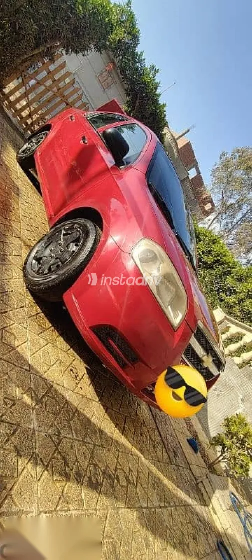 شيفروليه افيو 2009 أحمر مستعملة للبيع - 7