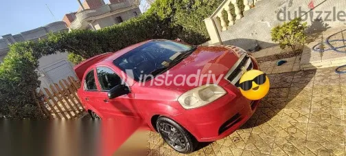 شيفروليه افيو 2009 أحمر مستعملة للبيع - 8